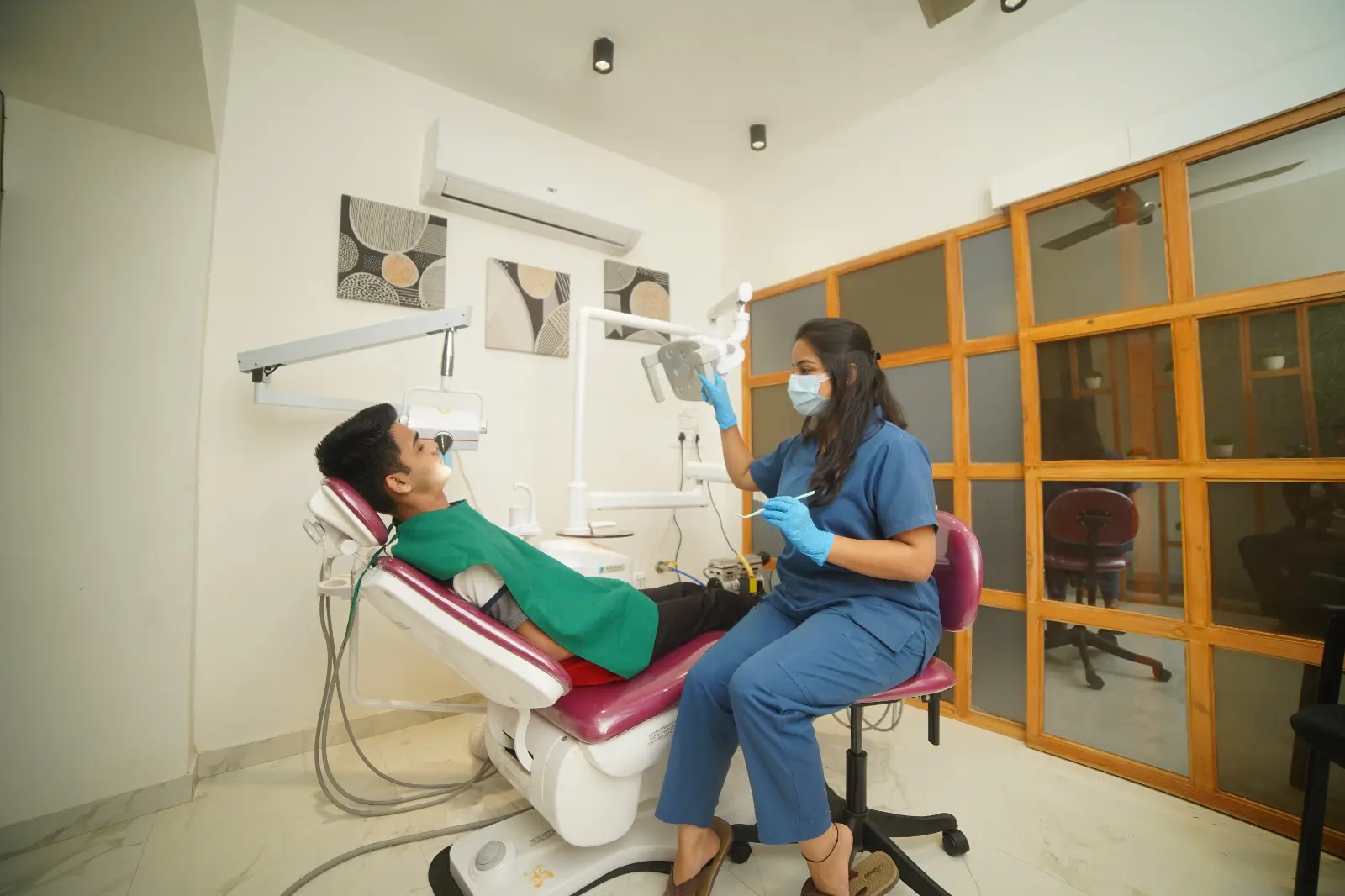 Patient receiving comfortable dental care at Thorve Dental Clinic